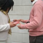 couple exchanging anniversary jewelry