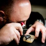 watchmaker servicing mechanical watch